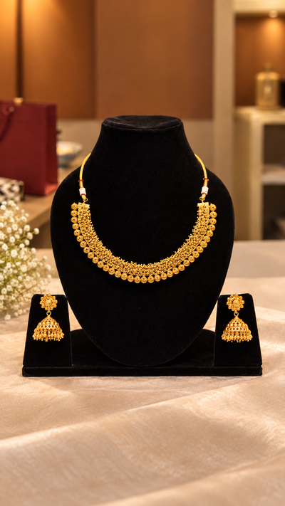 Traditional Gold-Plated Textured Necklace & Jhumka Set